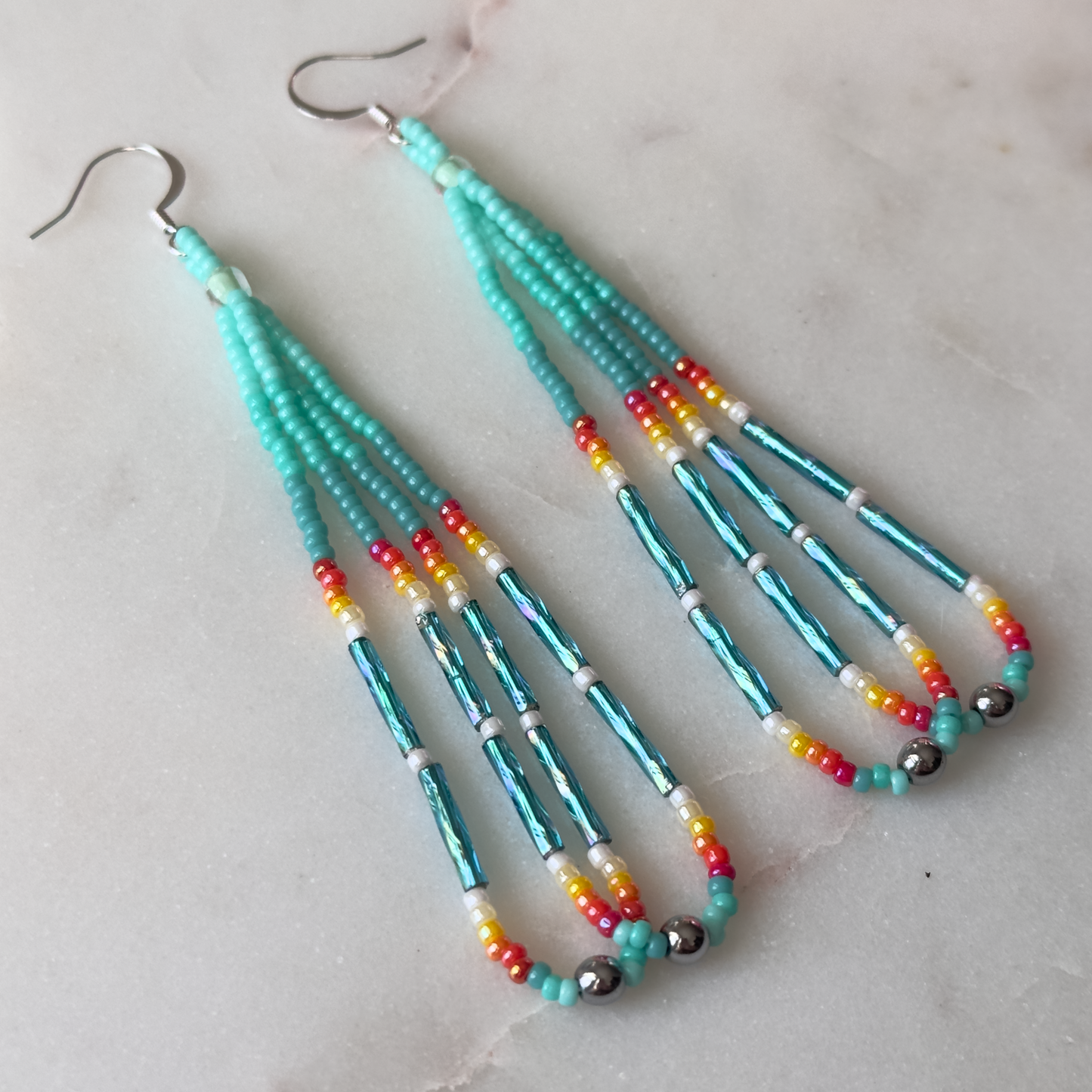 Oskē-Wvske Heleswv Okholatte (Turquoise Medicine Rainmist) Beaded Loop Earrings