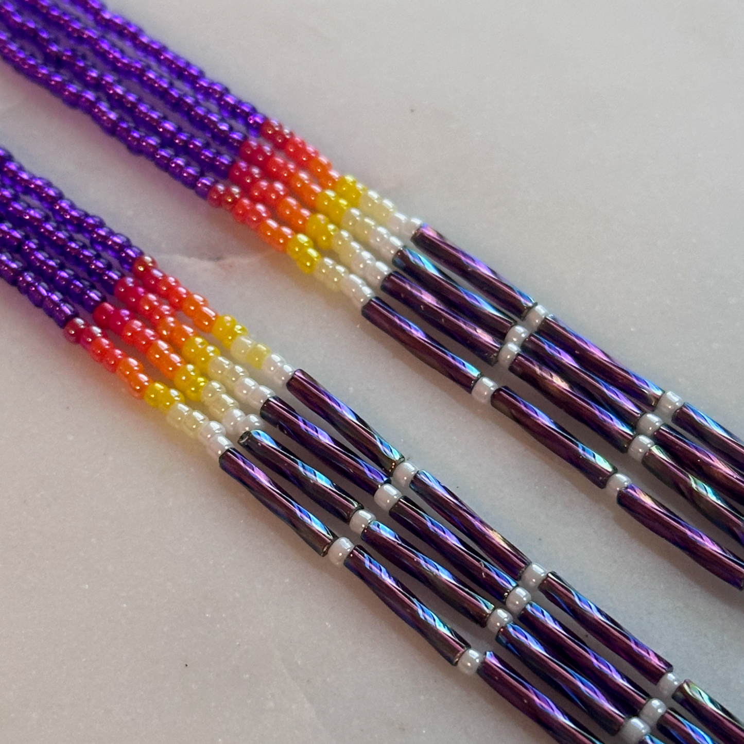 Oskē Heleswv Pvrko Omē (Purple Medicine Rainfall) Beaded Dangle Earrings